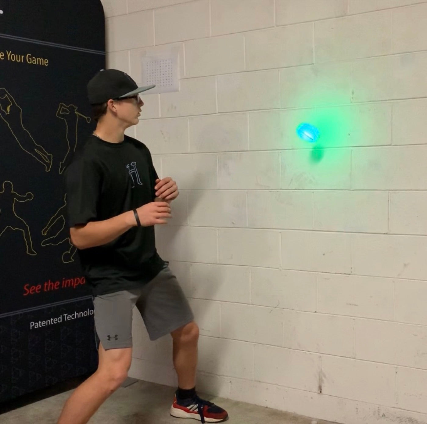 Athlete tracking a glowing Vector Ball